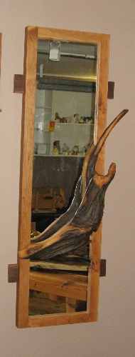 Image Don Bastian Carved Otter in Mirror
